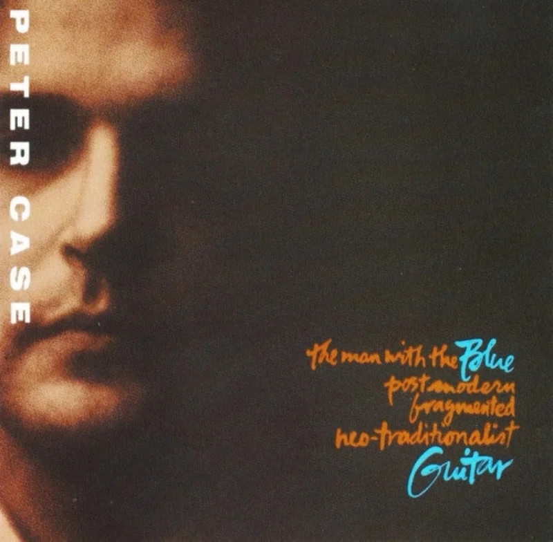 The Man With The Blue Postmodern Fragmented Neo-Traditionalist Guitar
